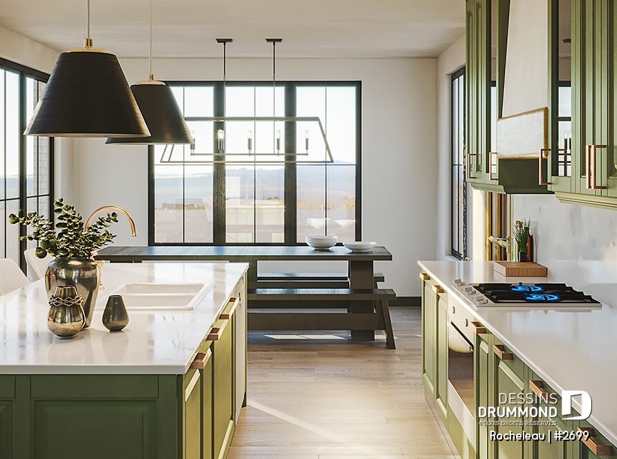 Cuisine moderne lumineuse avec grand îlot central, armoires vert sauge et aire ouverte conviviale