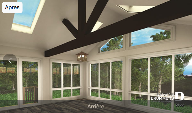 Intérieur d’un solarium 4 saisons lumineux avec grandes fenêtres et plafond cathédrale