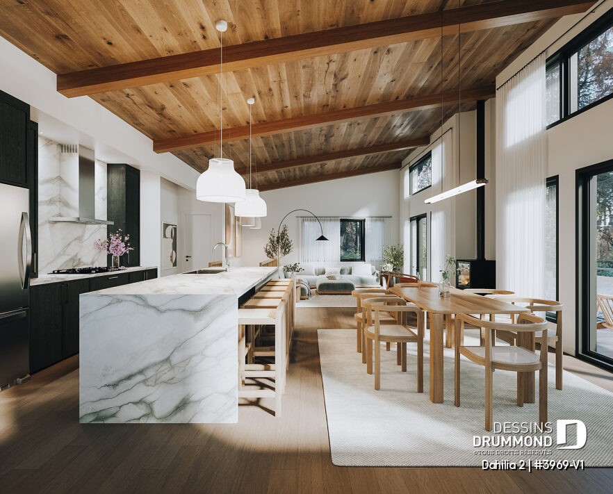 Cuisine à aire ouverte d'un plan de chalet avec rez-de-jardin Dahilia 2, avec grand îlot en quartz, plafond cathédrale, généreuse fenestration et foyer STÛV.
